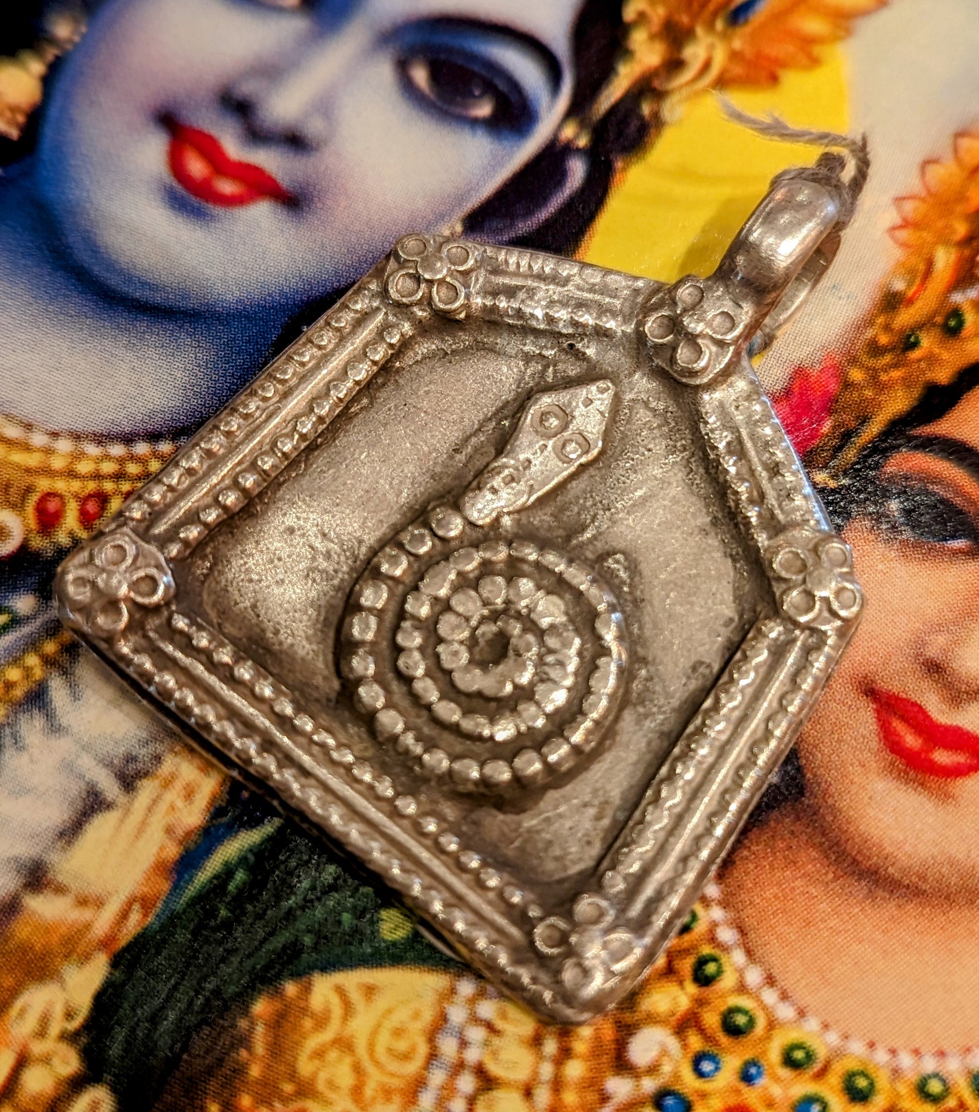 Antique silver serpent pendants