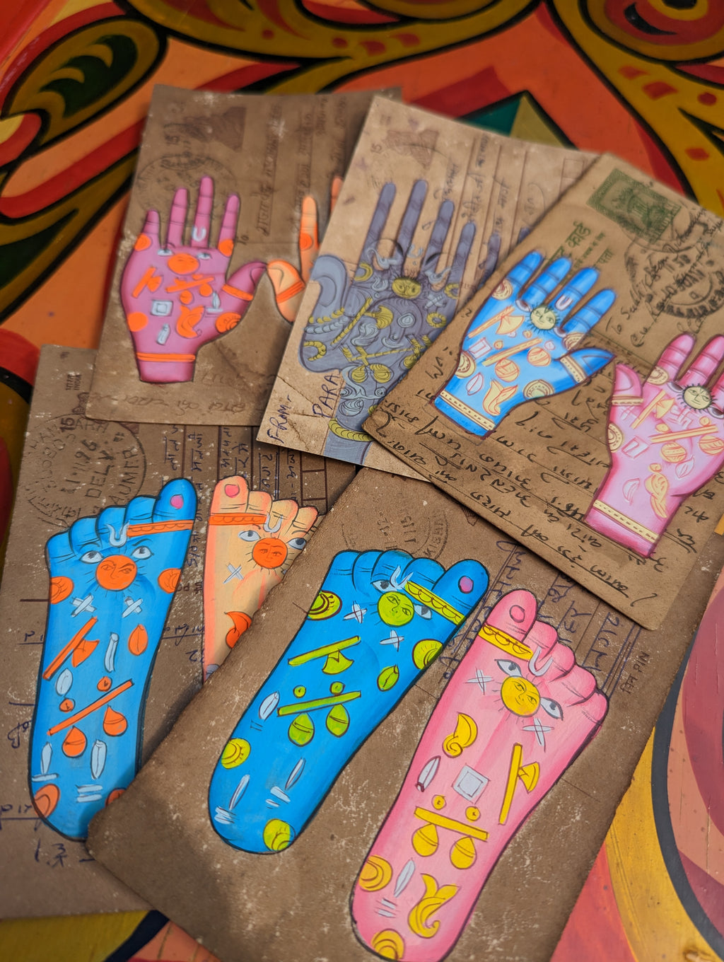 This form of painting in India is typically undertaken by the apprentices learning to paintdata:text/mce-internal,rte__editor,miniatures . They often used recycled documents, letters and in this case postcards. All are original pieces in glorious colours .

 

hands and feet chakras
