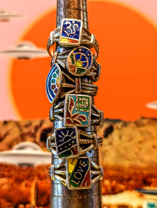 1980s Rajasthani initial rings,handmade in Pushkar around from silver with enamelled details.


These pieces vary in wear and tear, so please examine images!


Tribal antique silver traditionally has no hallmarks, but all that we sell have an 80-90% content, as these pieces would have been historically made from old melted down jewellery and coins.  

