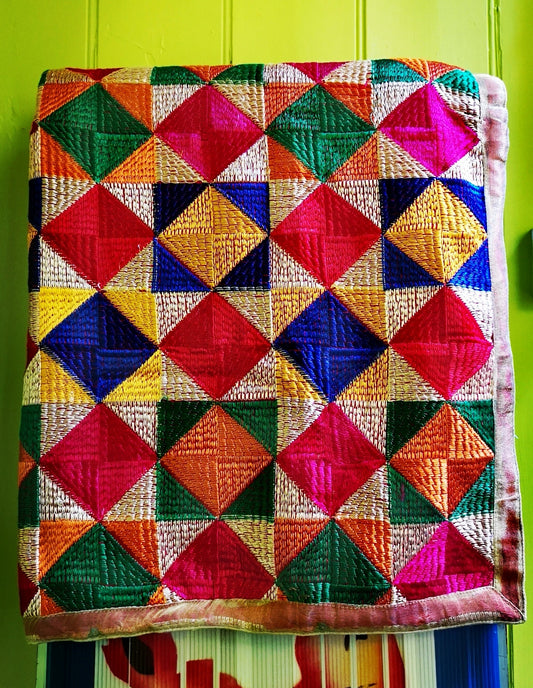 These are super loud, bold, almost sculptural due to their synthetic nature, shawls. An absolute favourite of ours as they totally transform an outfit!!! They are hand embroidered throughout with silk on an acrylic backing.

These are handmade pieces, all vary a little and due to being entirely stiched pulls will occur, but having enjoyed one for years, i think it merely adds to the texture of the piece!

220 x 90 cm approx

