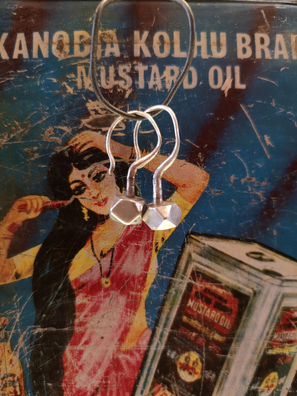 Squat faceted Rabari hook earring