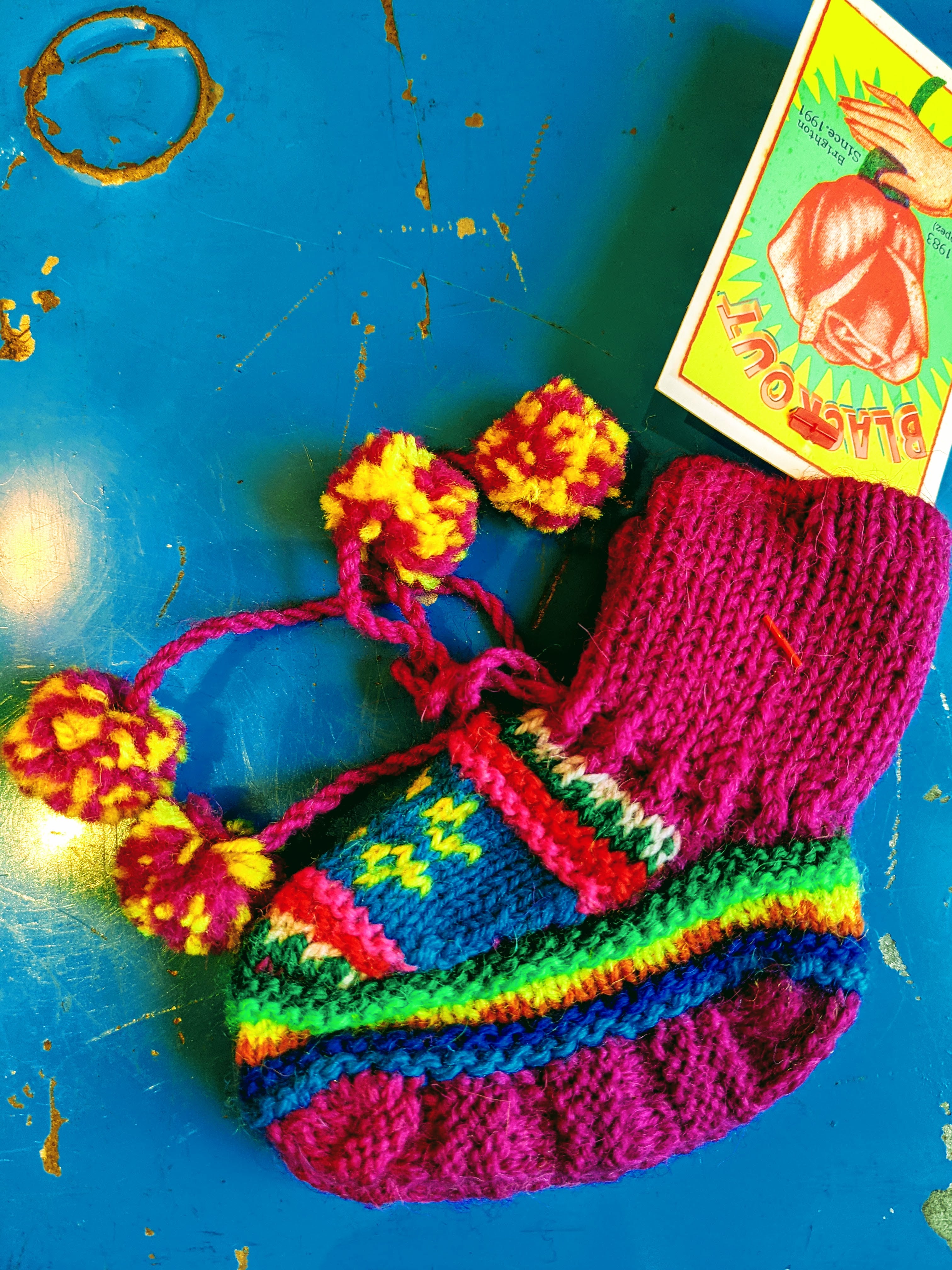 Super bright Peruvian kids booties.  These super stretchy Peruvian kids booties are perfect for keeping the kids feet toasty warm all winter and very fashionable in the warmer months too!!  6 - 18 months  Acrylic hand or machine wash.